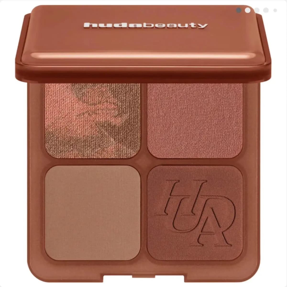 Tan palette with pink and bronze marbled shimmer, rosy mauve, taupe matte and deep brown embossed bronzer.
