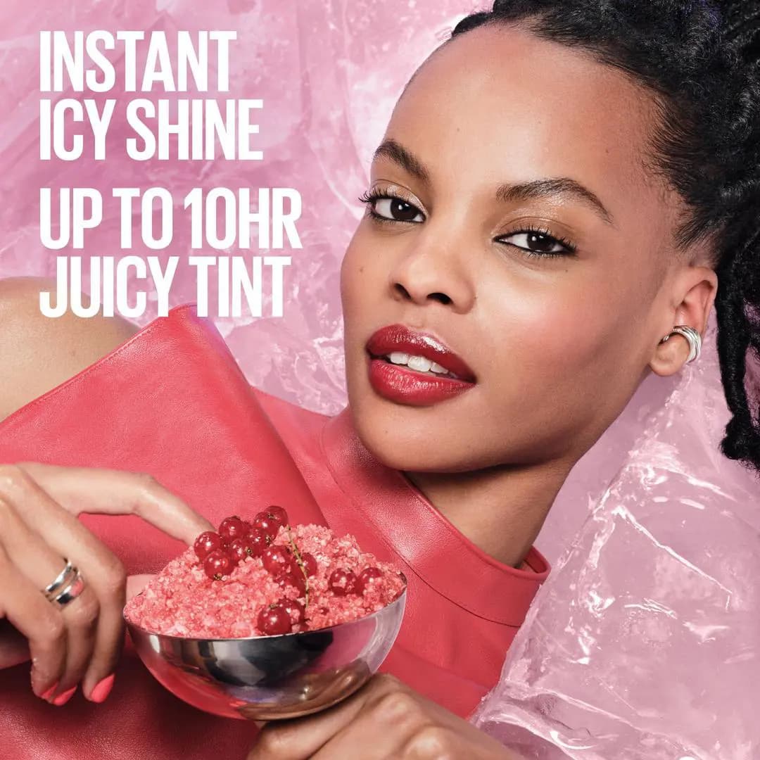 Model with glossy red lips holding a bowl of red berries on shaved ice, text claims up to 10hr juicy tint