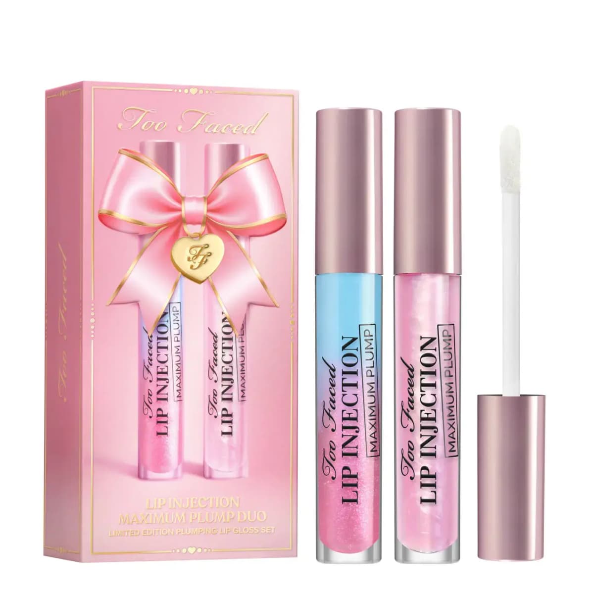 Lip Injection Maximum Plump duo with blue and pink glosses in rose-gold tubes and pink bow-decorated box.
