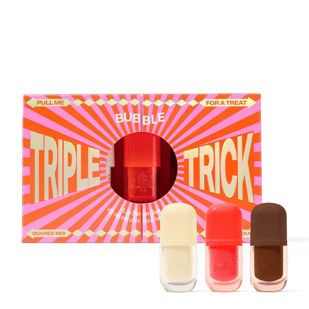 Triple Trick pink and orange sunburst Lip Serum Set box with cream, red and brown lip serum bottles in front