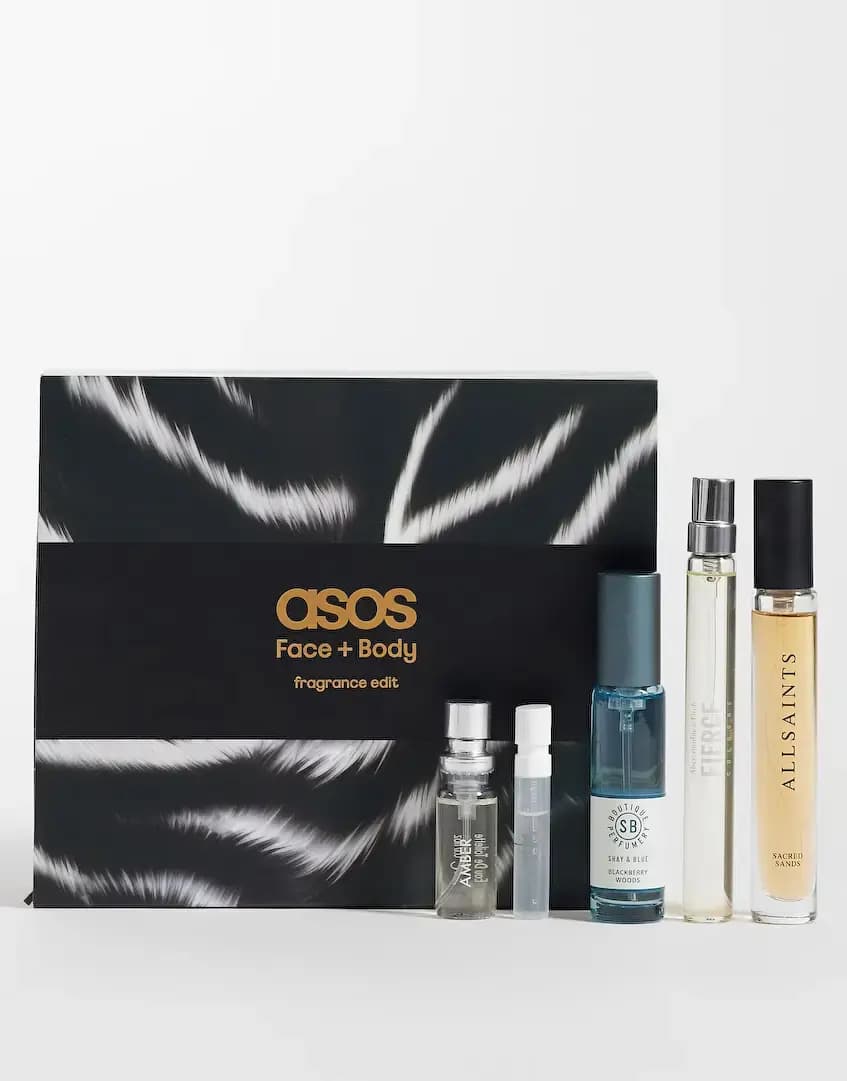 ASOS Men's Fragrance Wardrobe in black and white zebra-print box with five sprays including AllSaints Sacred Sands