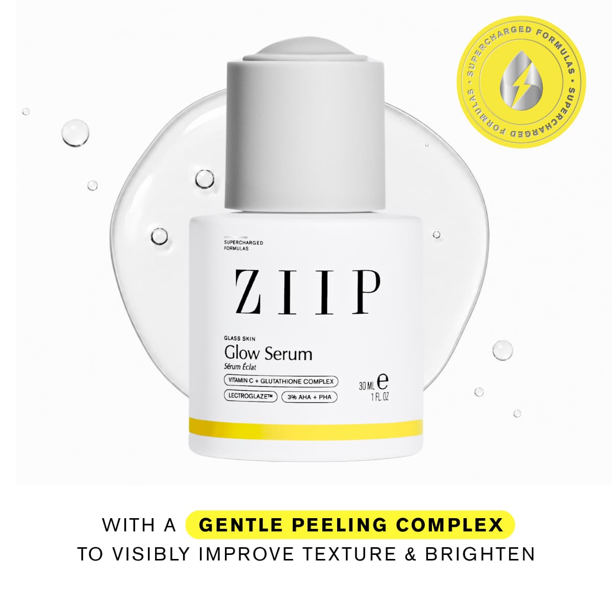 Glow Serum in a white bottle with grey dropper cap set on a clear gel puddle with bubbles