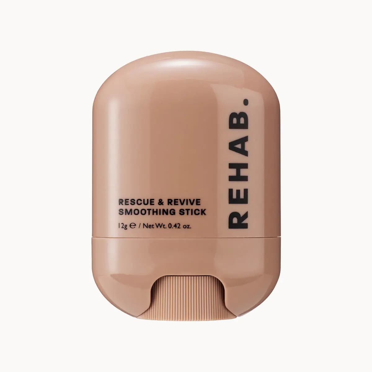 Smoothing Stick in a rounded glossy nude case with a ribbed twist base, 12g