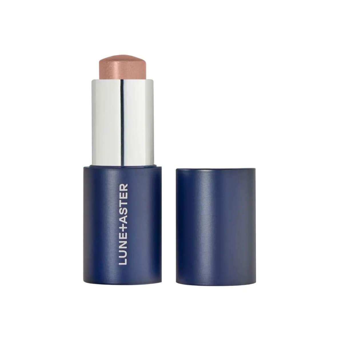 Uncapped navy stick with a shimmering rose-champagne bullet next to its cap