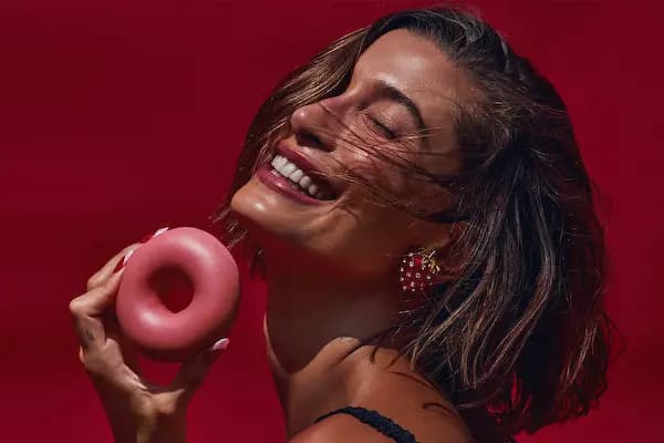 rhode x Krispy Kreme Peptide lip treatment in Strawberry Glaze