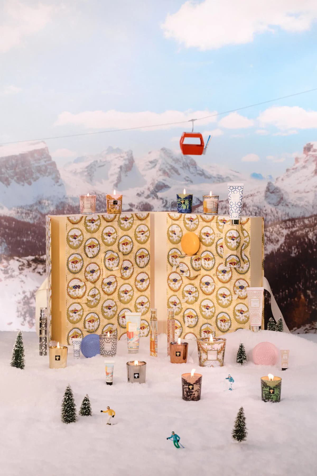 Baobab Collection Voyage Extraordinaire advent calendar displayed with lit candles