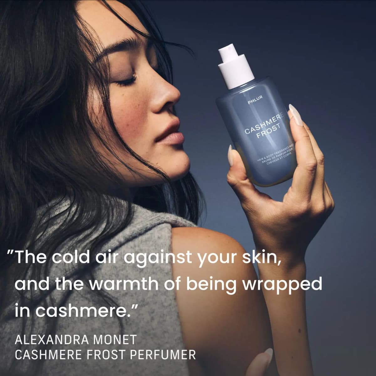 Dark-haired model in a grey knit smells a Cashmere Frost bottle, with a quote from perfumer Alexandra Monet.